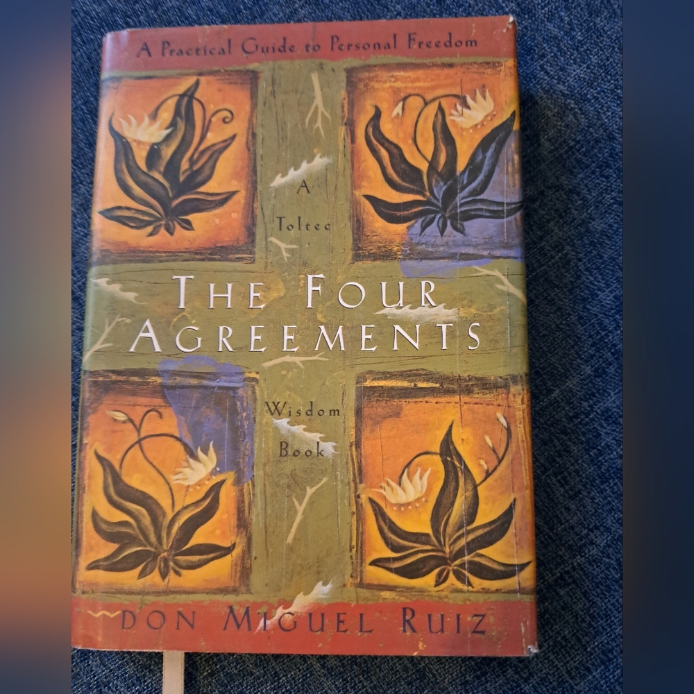 The Four Agreements by Don Miguel Ruiz.